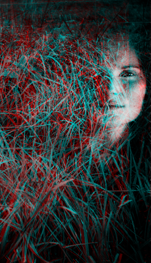 3D image with separate cyan and magenta layers that shows a multiple exposure image of a woman staring into the camera, surrounded by grass.